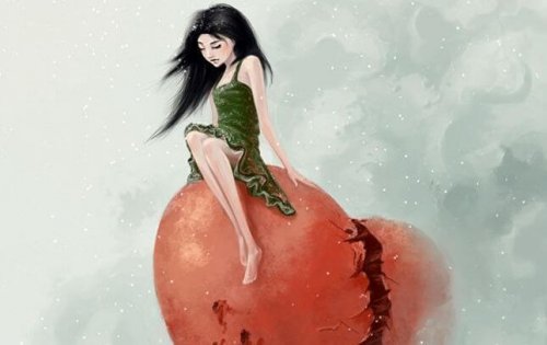 Tyttö rikkoutuneen sydämen päällä