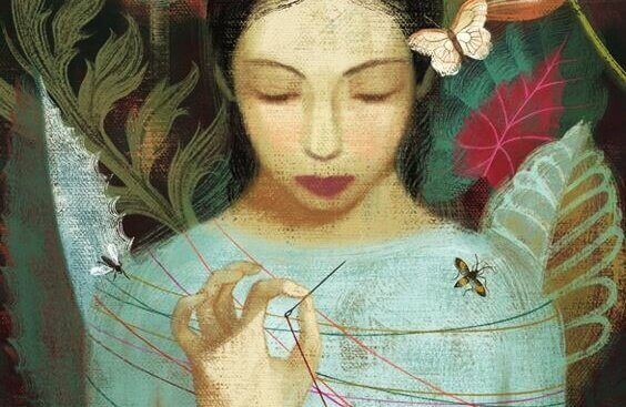 nainen ja lanka ja neula