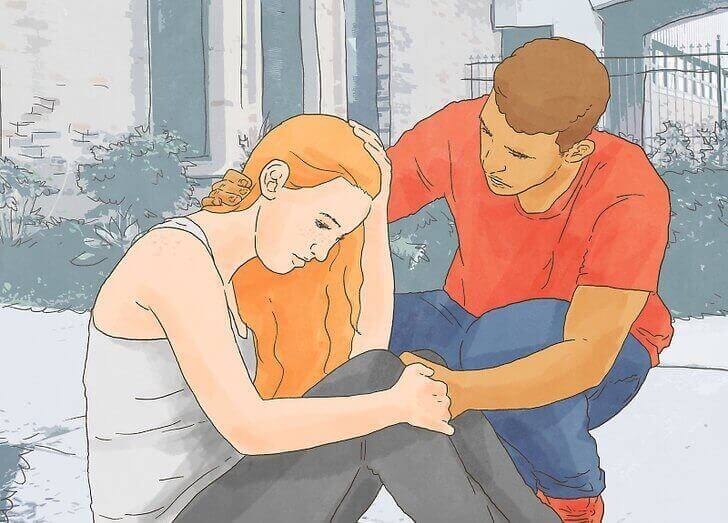 mies lohduttaa naista