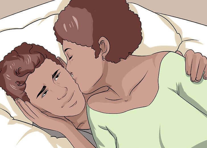 pariskunta suukottelee